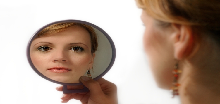 image of giant mirror with face